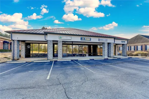 a view of a building with a patio