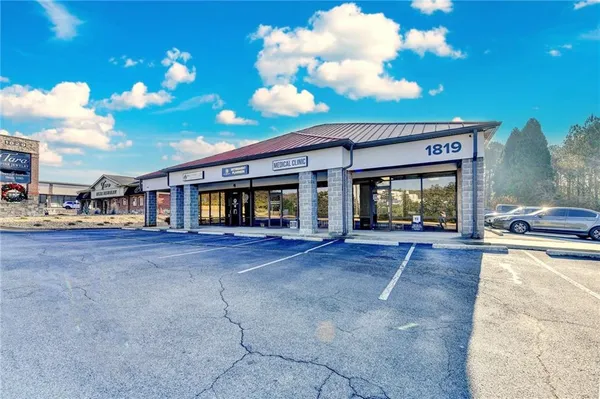 a view of a house with tub and front view