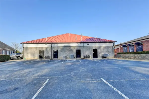 a front view of a house with yard