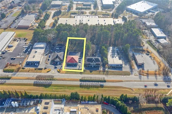 a view of yard with patio