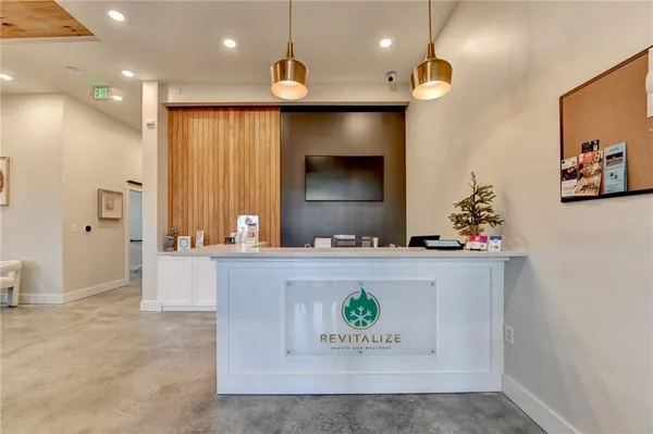 a bathroom with a sink a mirror and a bathtub