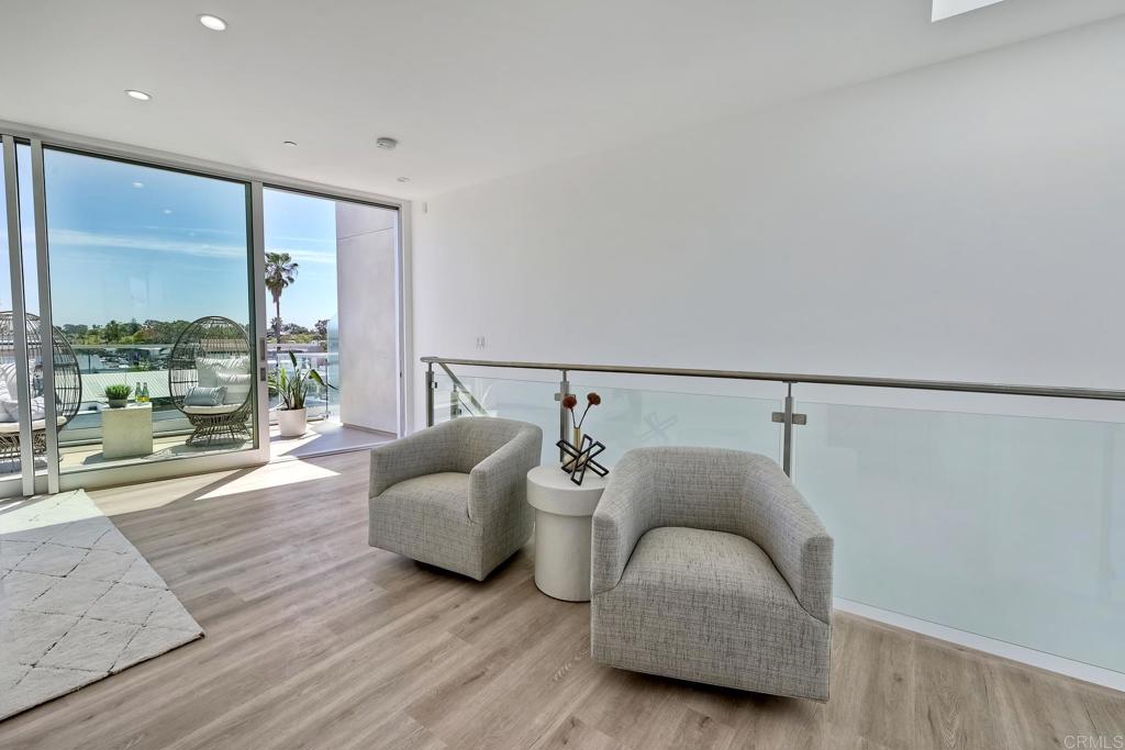 2646 State Street, Unit D Carlsbad, CA 92008 - Photo 2 of 43 a living room with furniture and large windows