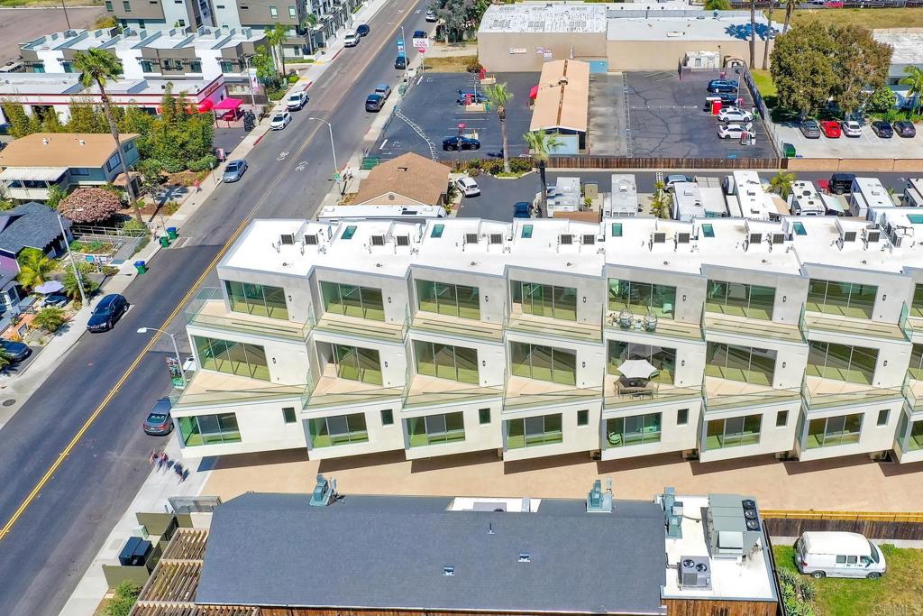 2646 State Street, Unit D Carlsbad, CA 92008 - Photo 35 of 43 a front view of a building with glass windows