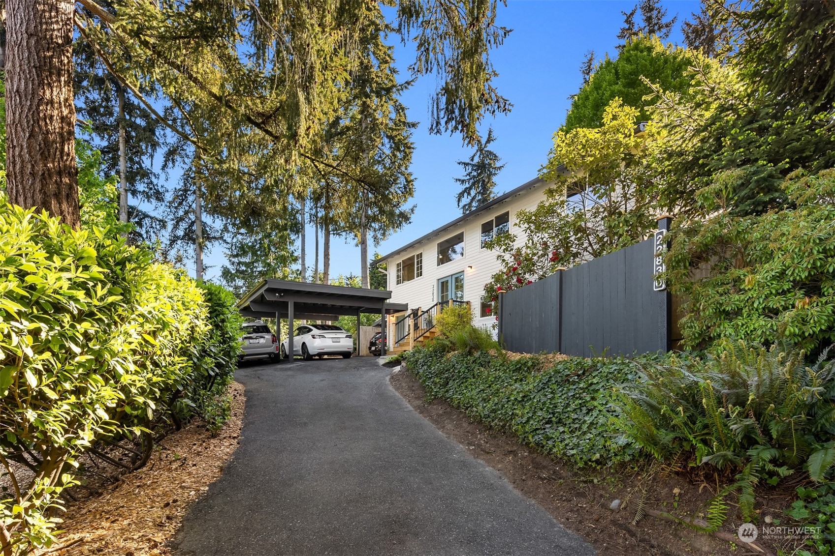 22830 Atlas Road Bothell, WA 98021 - Photo 2 of 40 a view of a house with a yard and potted plants