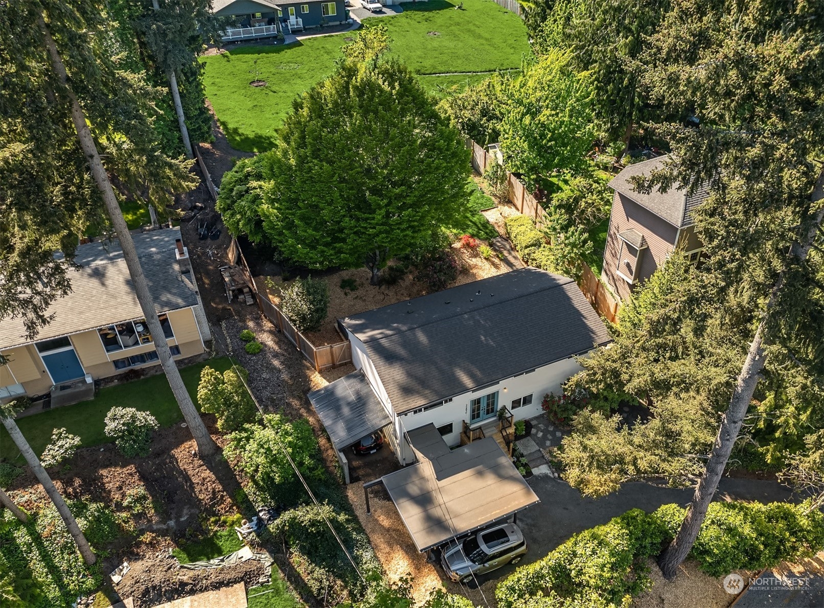 22830 Atlas Road Bothell, WA 98021 - Photo 40 of 40 an aerial view of house with yard swimming pool and outdoor seating