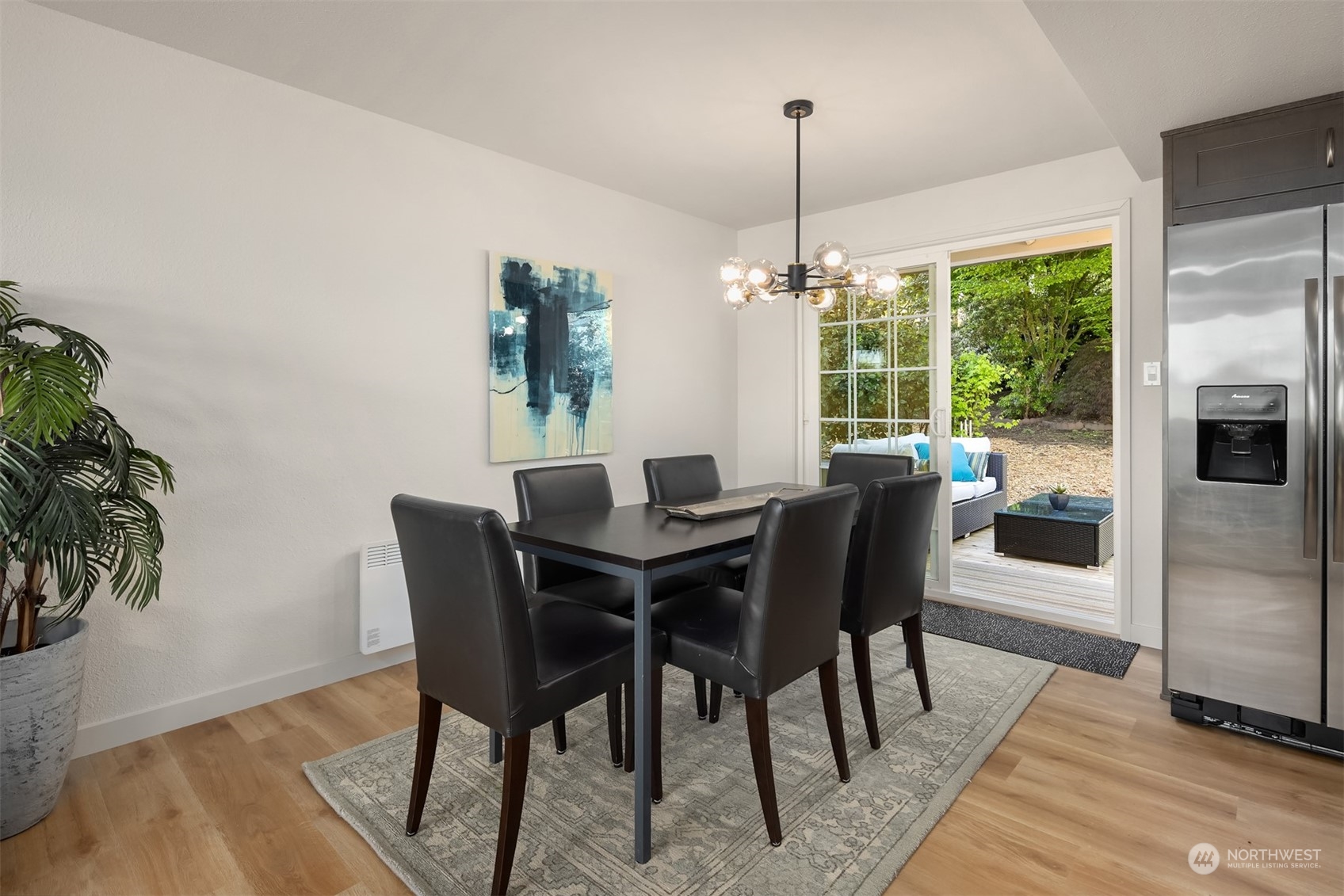 22830 Atlas Road Bothell, WA 98021 - Photo 7 of 40 a view of a dining room with furniture window and outside view