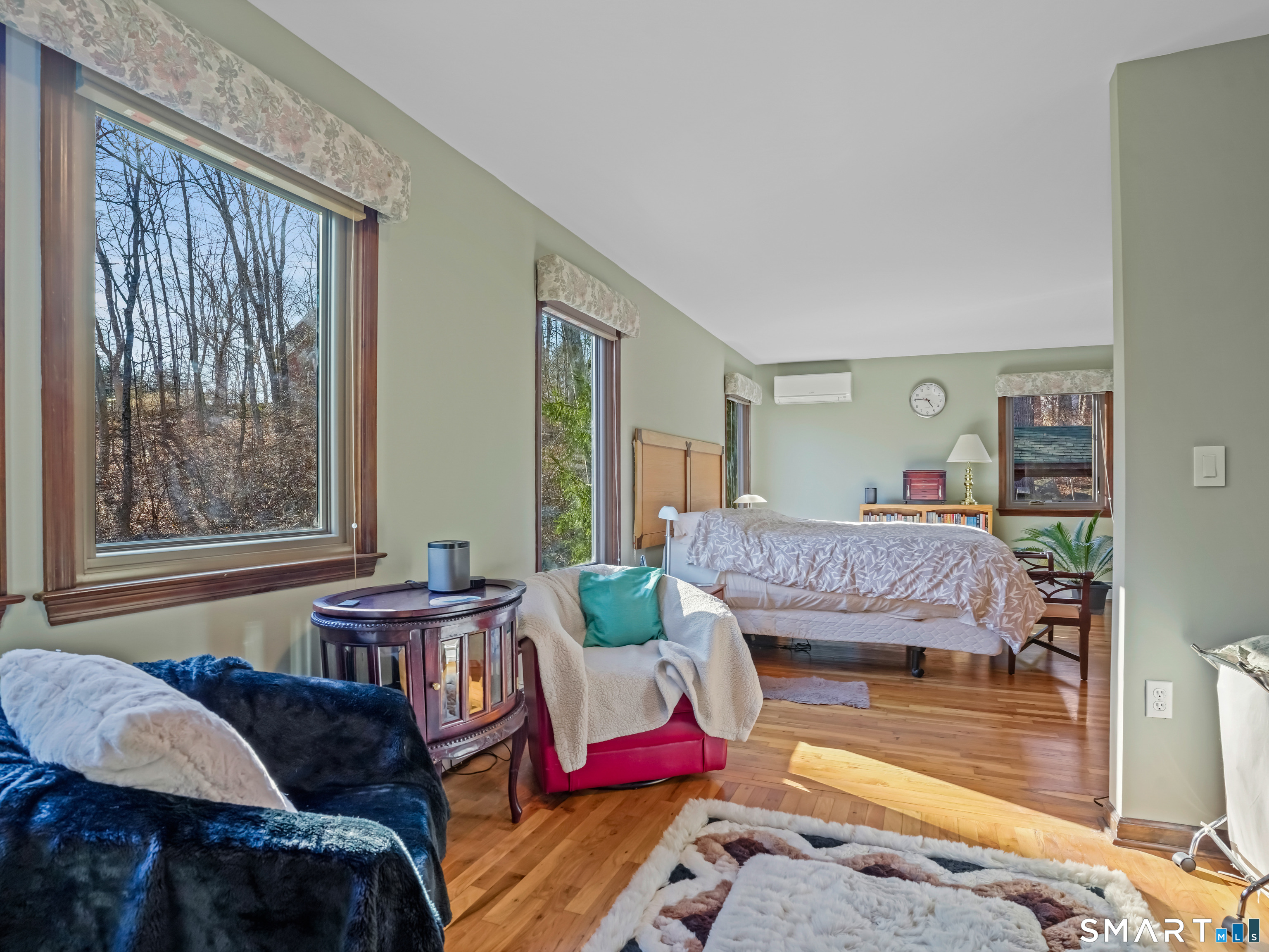 208 Cascade Road Stamford, CT 06903 - Photo 15 of 31 a bedroom with furniture and a large window