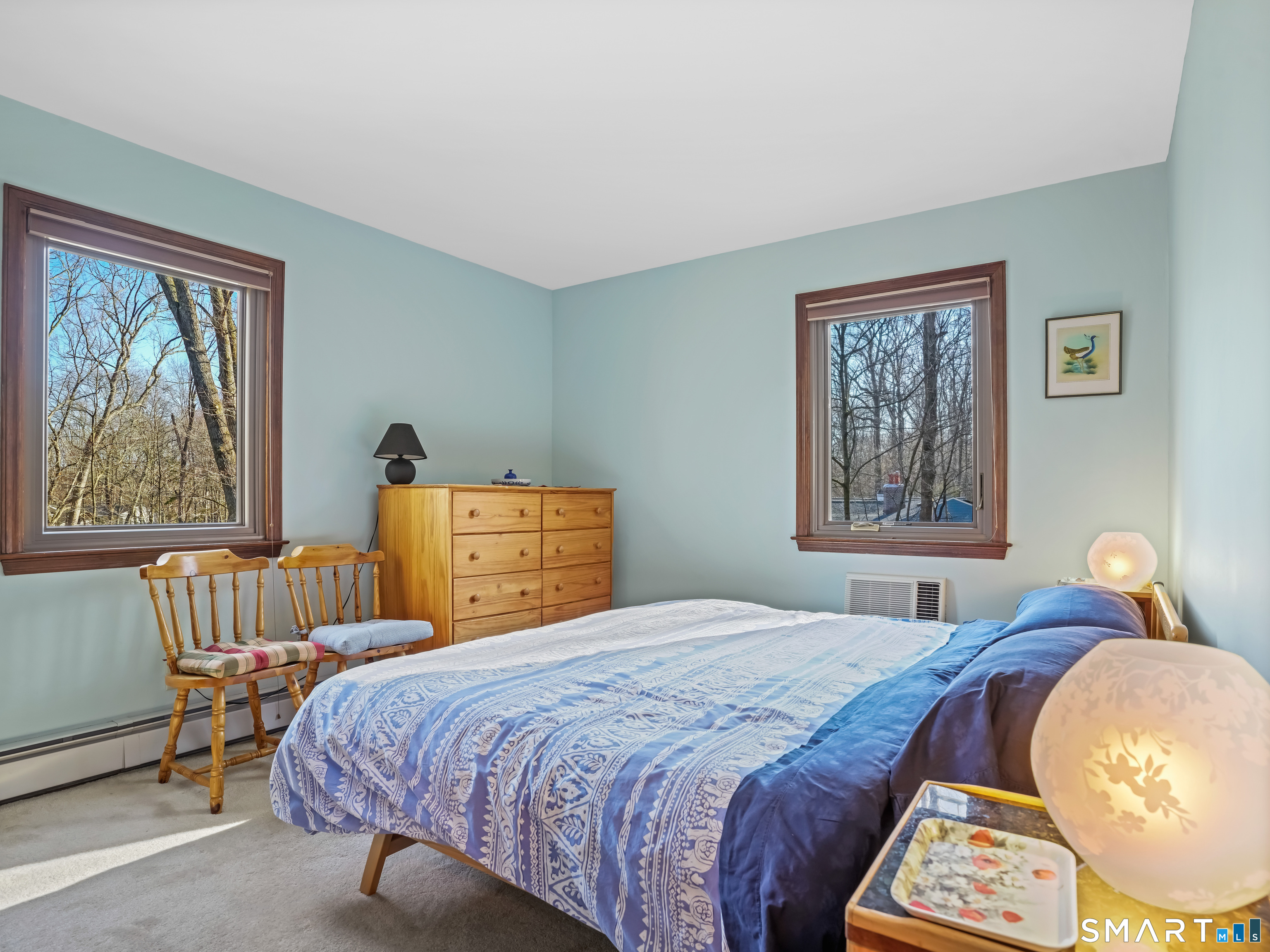 208 Cascade Road Stamford, CT 06903 - Photo 20 of 31 a bedroom with a bed and a window