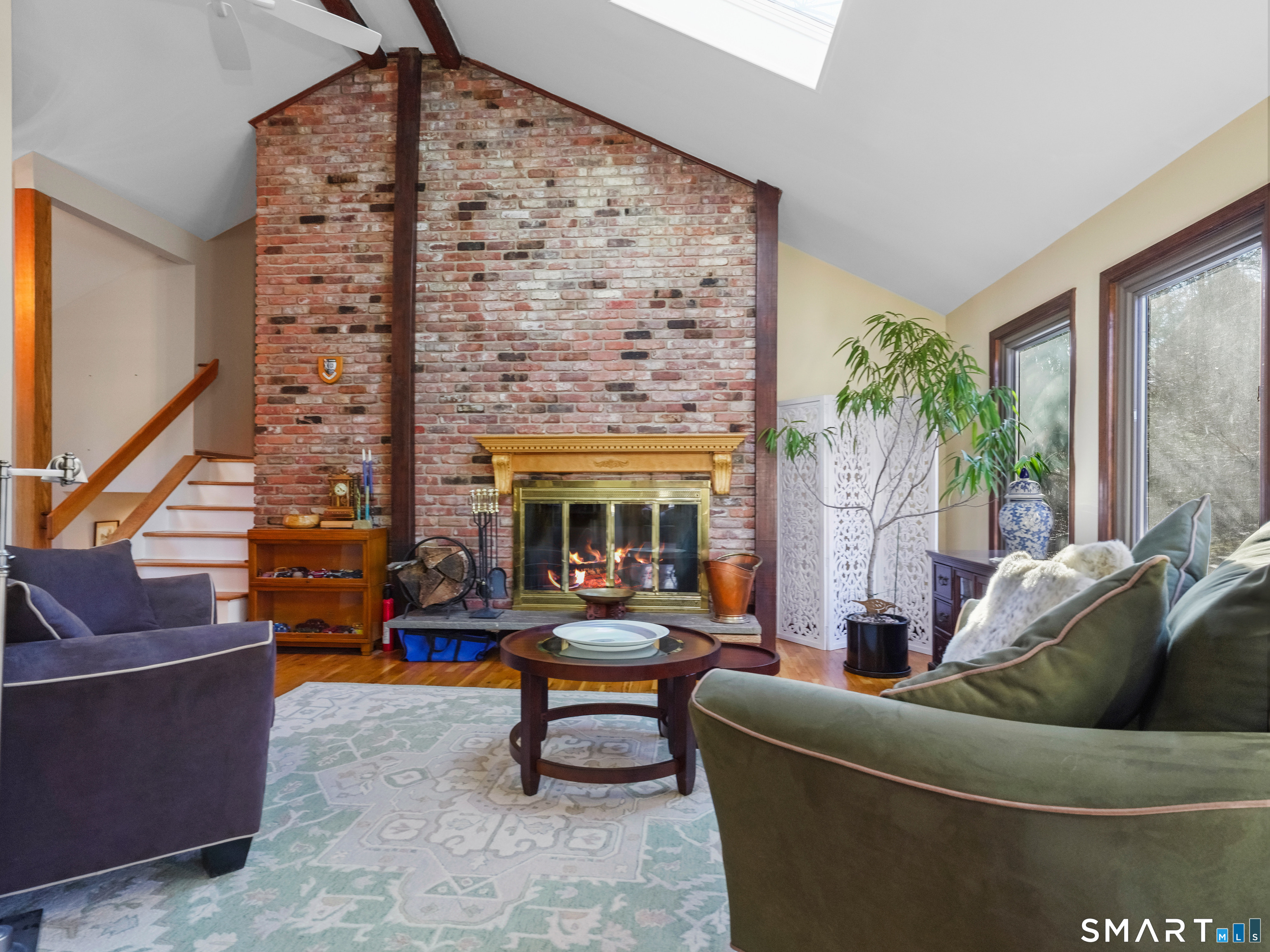 208 Cascade Road Stamford, CT 06903 - Photo 9 of 31 a living room with furniture and a large window