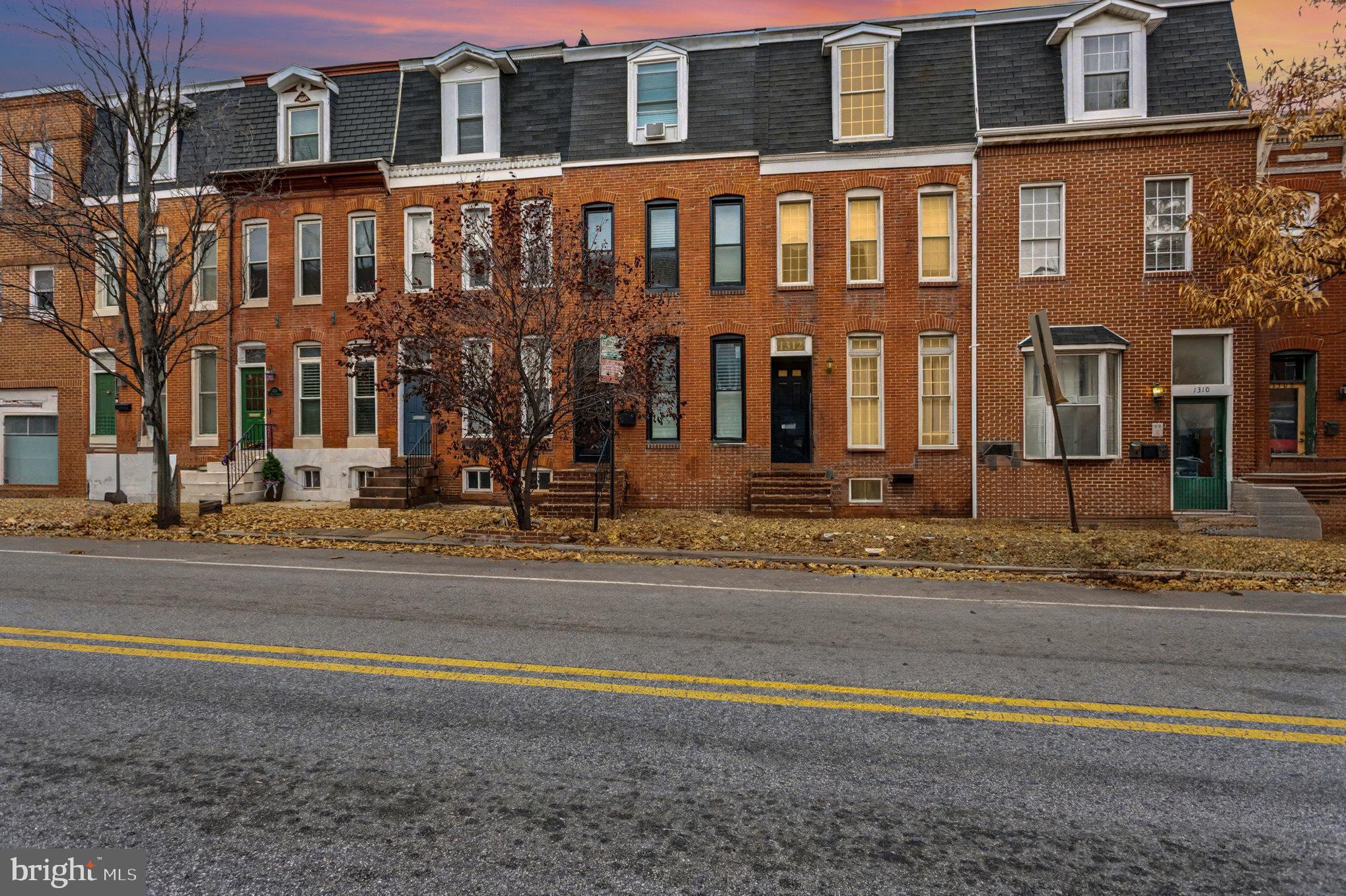 1314 South Hanover Street Baltimore, MD 21230 - Photo 2 of 30 a front view of a building with a street