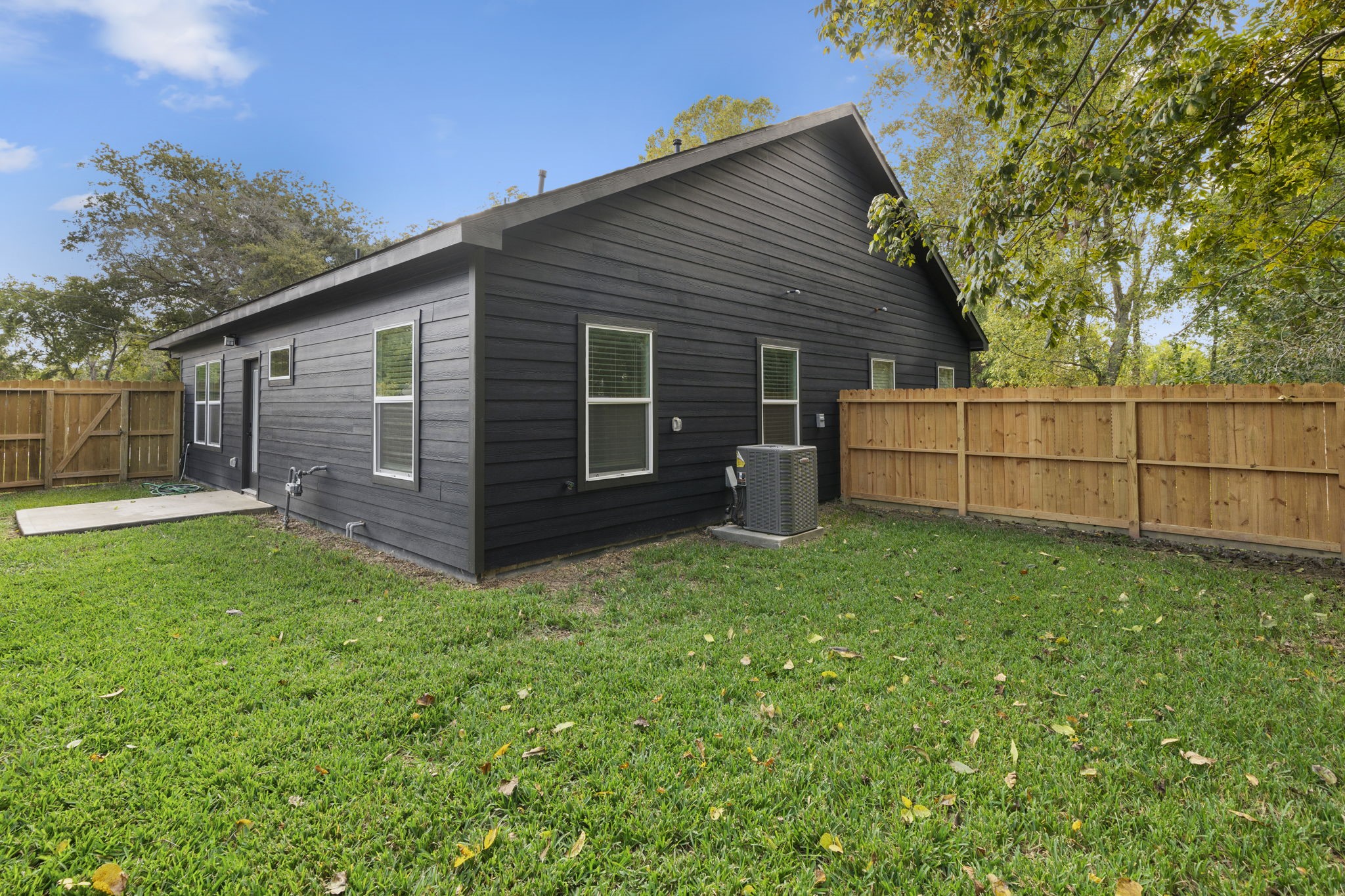 7205 Tippett Street, Unit B Houston, TX 77088 - Photo 15 of 15 a view of a backyard with a garden