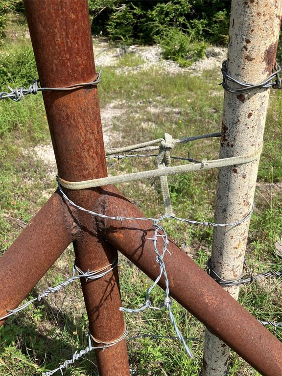 3510 Telephone Road Dallas, TX 75134 - Photo 31 of 34 a view of a balcony with floor to ceiling windows and wooden fence