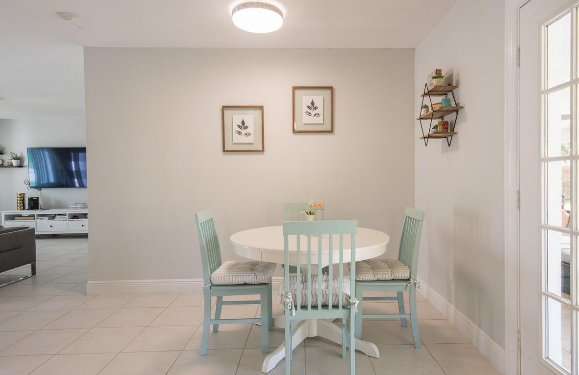 4244 Appalachian Street Boca Raton, FL 33428 - Photo 18 of 25 a view of a dining room with furniture and window