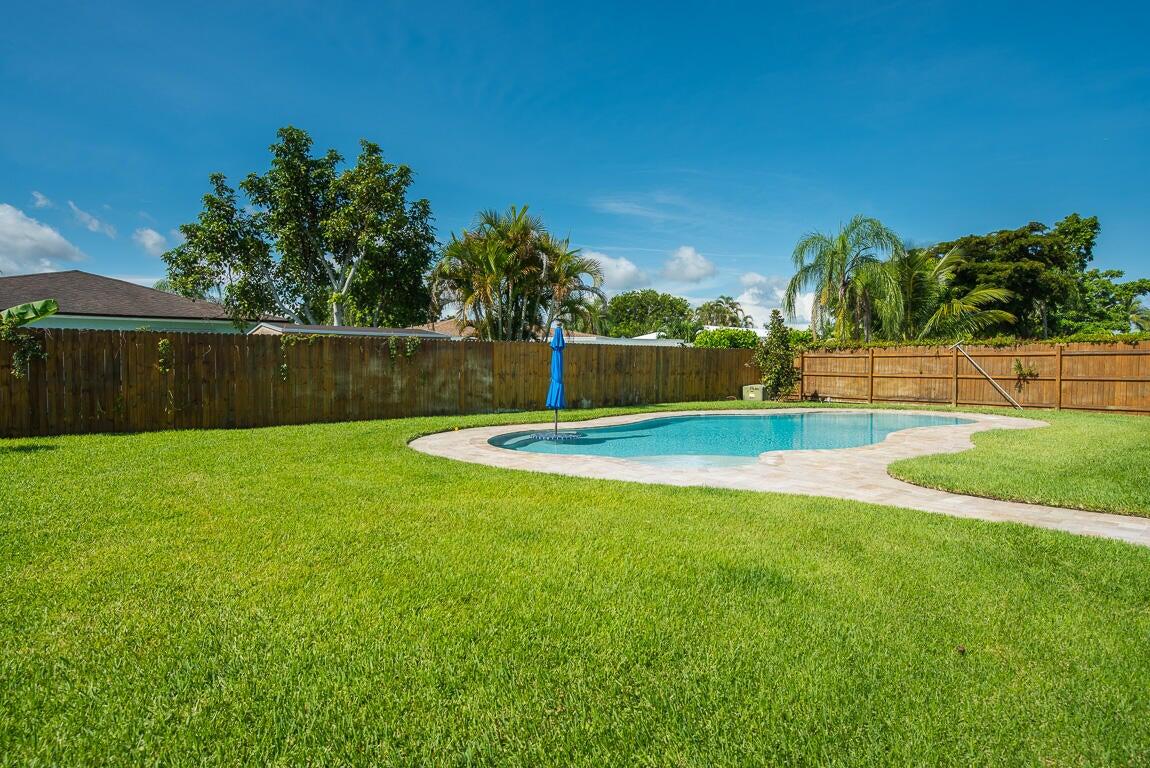 4244 Appalachian Street Boca Raton, FL 33428 - Photo 10 of 25 a swimming pool with outdoor space