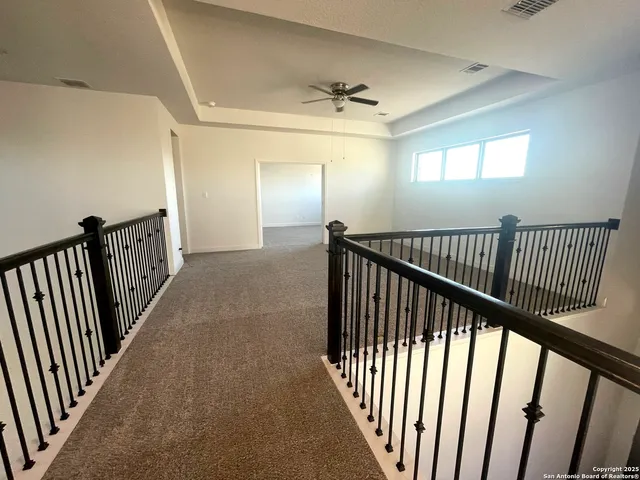 a bathroom with a glass door shower