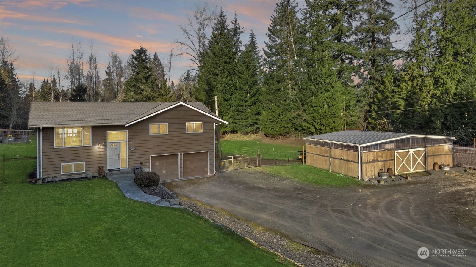13925 Dubuque Road Snohomish, WA 98290 - Photo 1 of 40 a view of a house with a yard and large trees