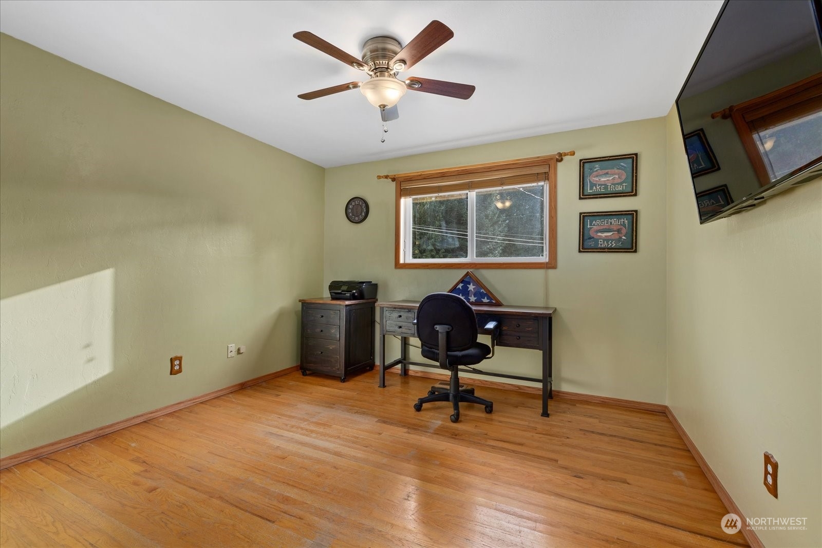13925 Dubuque Road Snohomish, WA 98290 - Photo 17 of 40 a view of a workspace with furniture and a ceiling fan