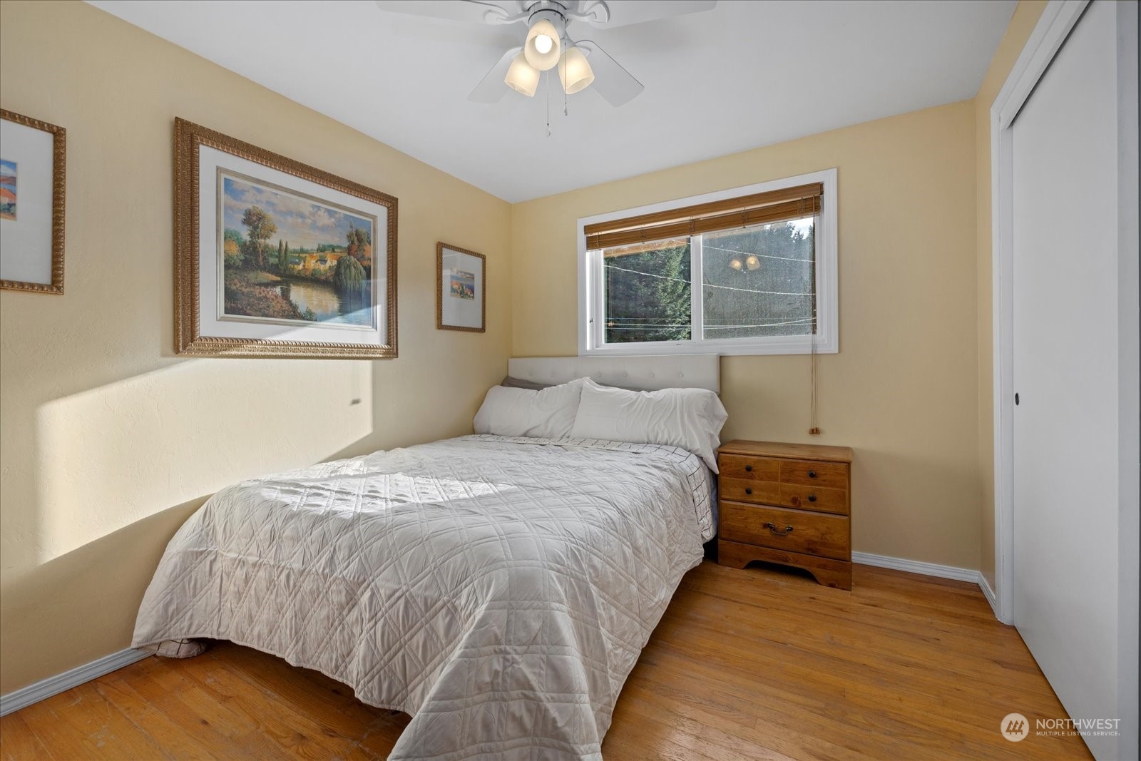 13925 Dubuque Road Snohomish, WA 98290 - Photo 18 of 40 a bedroom with a bed and a painting on the wall