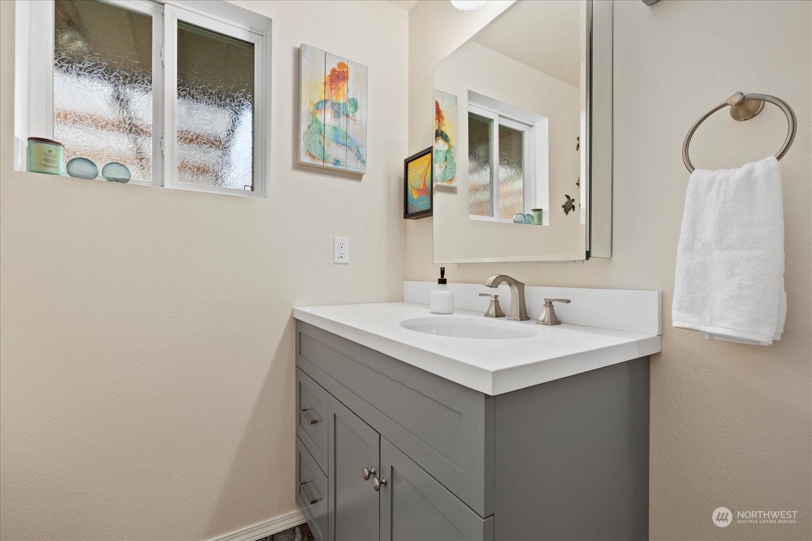 13925 Dubuque Road Snohomish, WA 98290 - Photo 20 of 40 a bathroom with a sink and a mirror