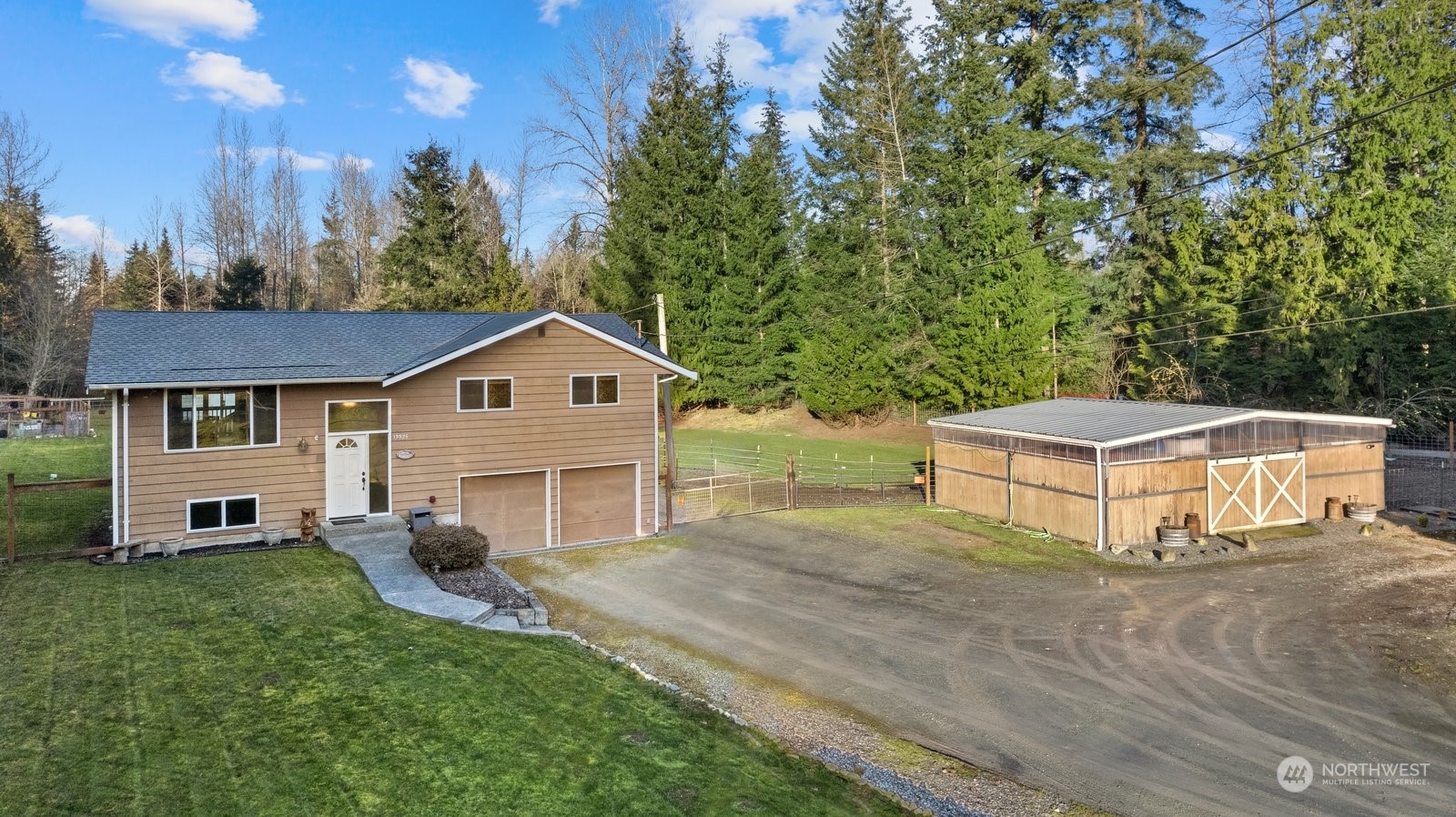 13925 Dubuque Road Snohomish, WA 98290 - Photo 2 of 40 a view of a house with a yard