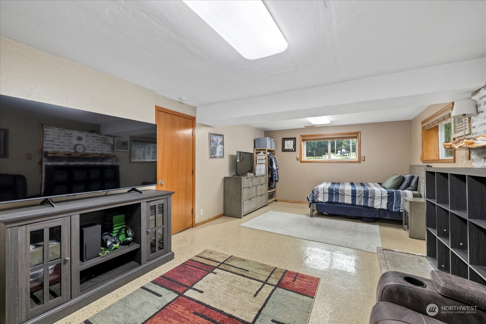 13925 Dubuque Road Snohomish, WA 98290 - Photo 23 of 40 a living room with furniture and a fireplace