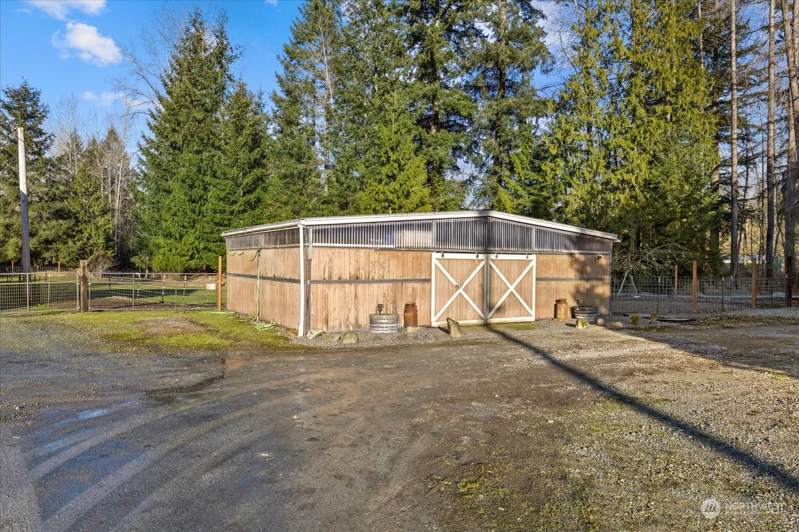 13925 Dubuque Road Snohomish, WA 98290 - Photo 34 of 40 a view of a house with backyard and trees