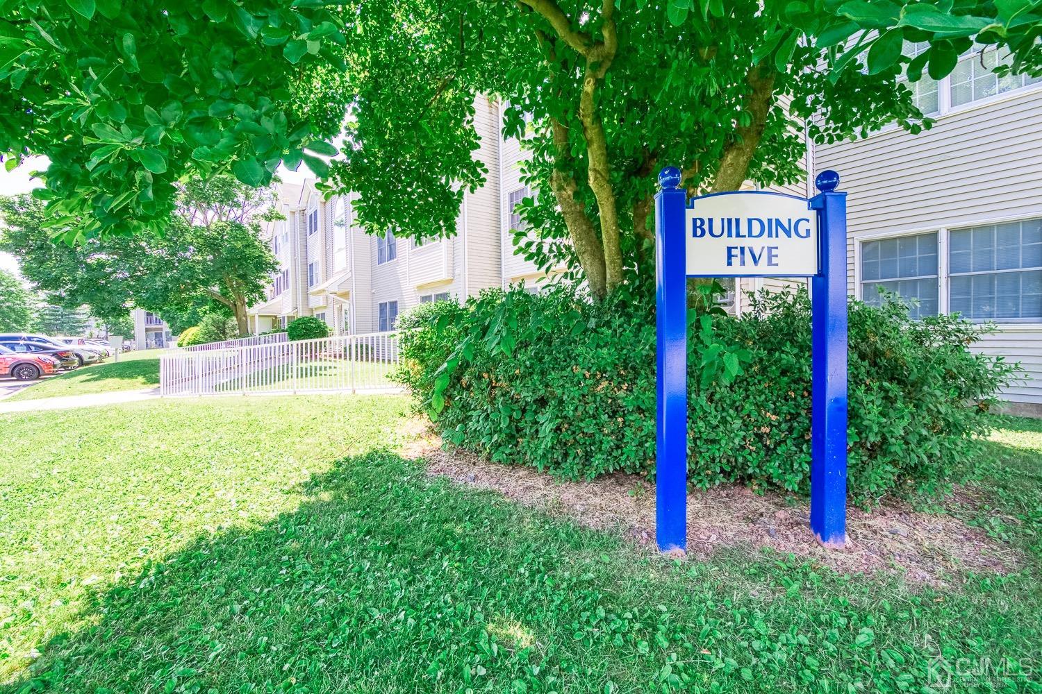 520 Edpas Road New Brunswick, NJ 08901 - Photo 2 of 15 a sign that is sitting in front of a house