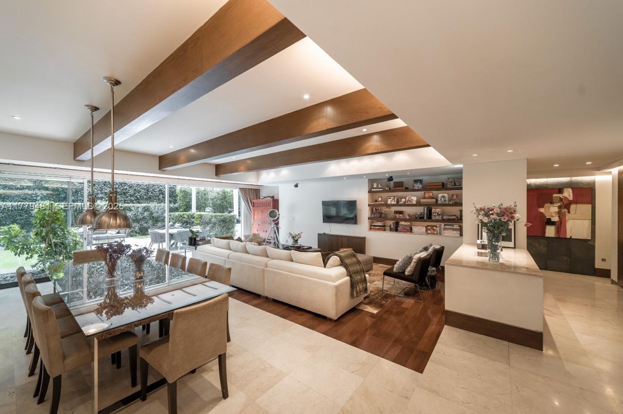 undefined, FL 11000 - Photo 2 of 27 a living room with furniture and a large window