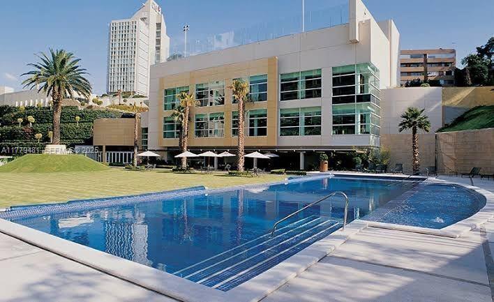 undefined, FL 11000 - Photo 22 of 27 a swimming pool with outdoor seating and yard