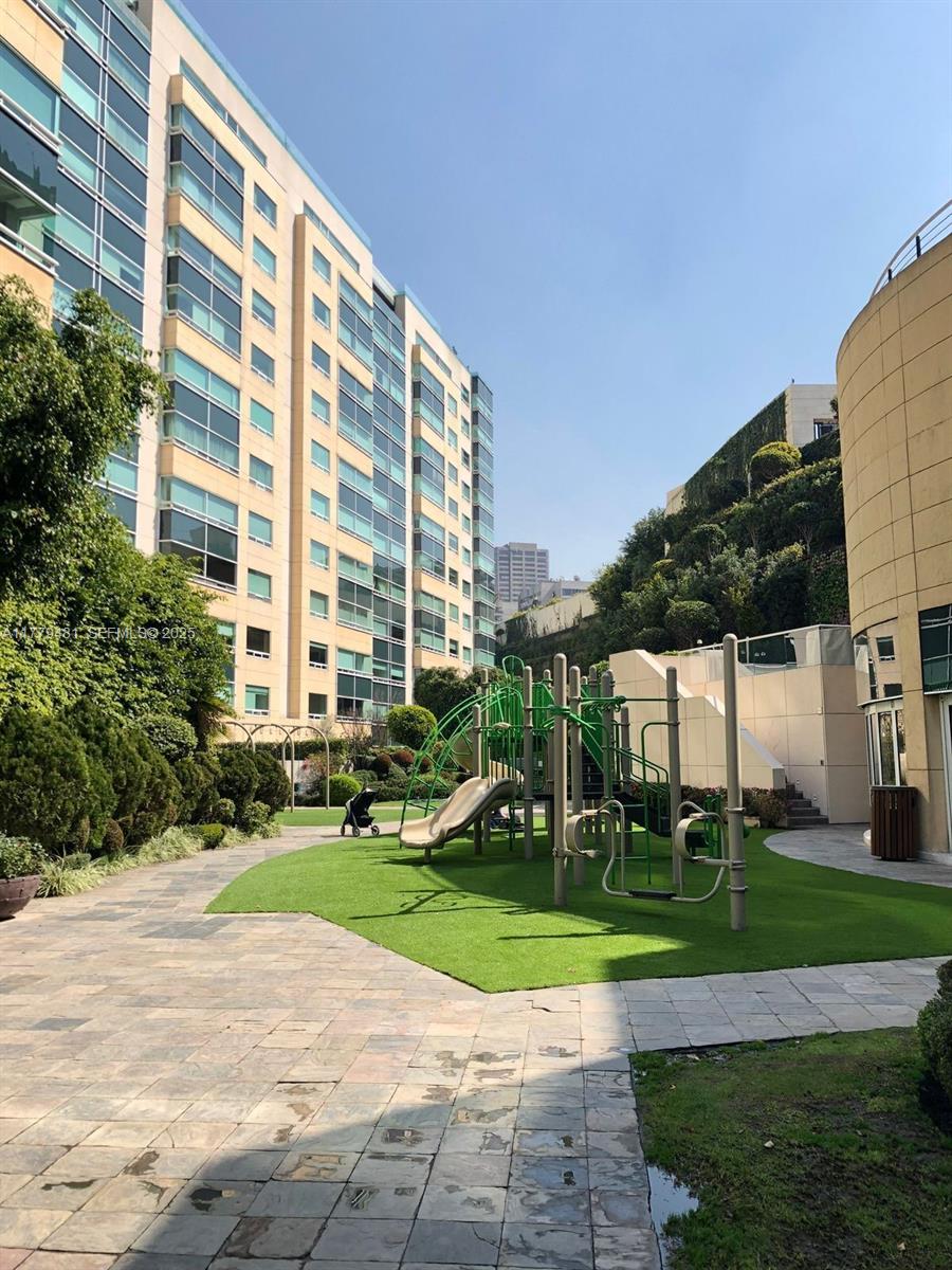 undefined, FL 11000 - Photo 25 of 27 a view of a building with a yard