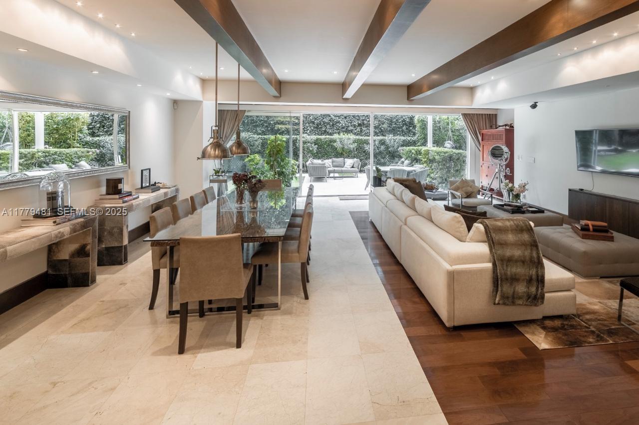 undefined, FL 11000 - Photo 3 of 27 a living room with fireplace furniture and a large window