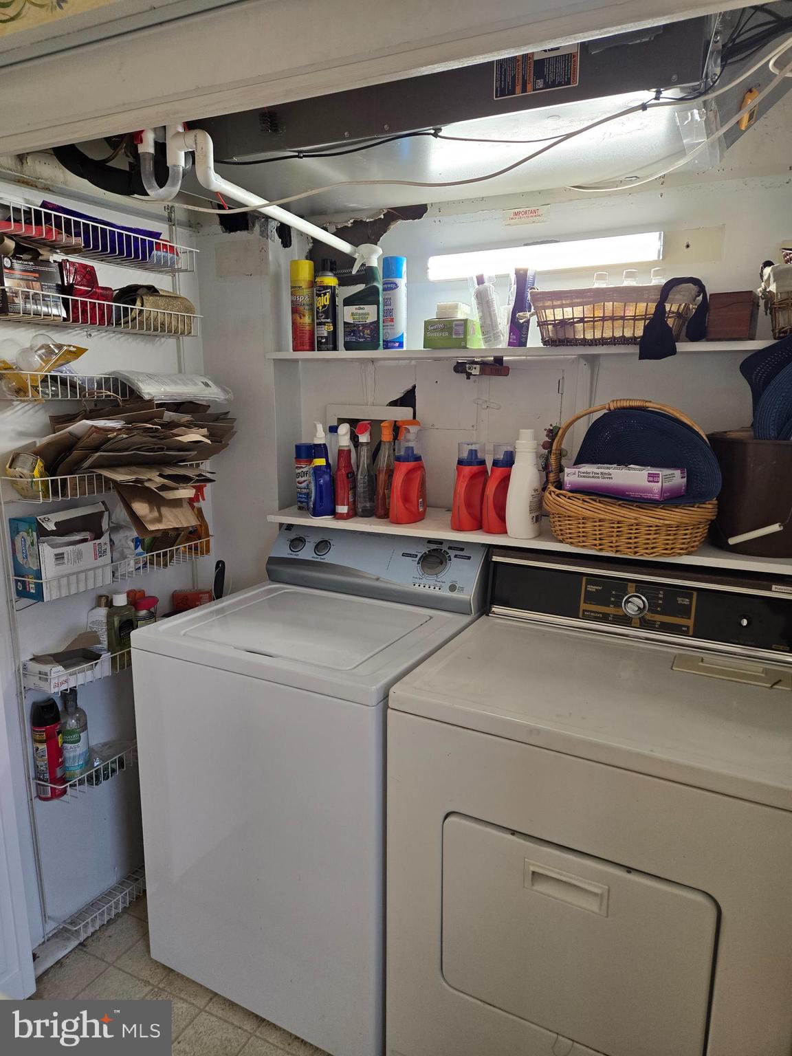 1000 Putnam Boulevard, Unit 603 Wallingford, PA 19086 - Photo 17 of 44 a utility room with dryer and washer