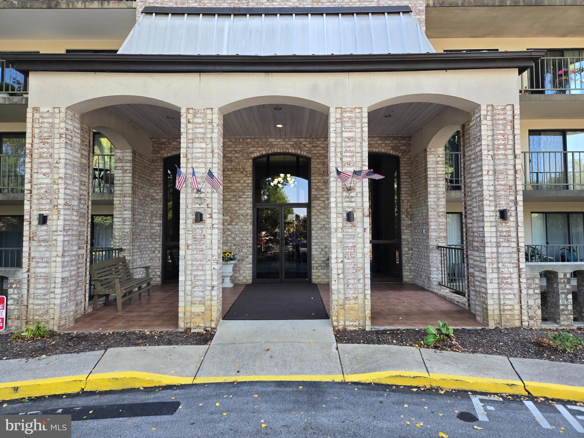 1000 Putnam Boulevard, Unit 603 Wallingford, PA 19086 - Photo 3 of 44 a view of pool with small yard