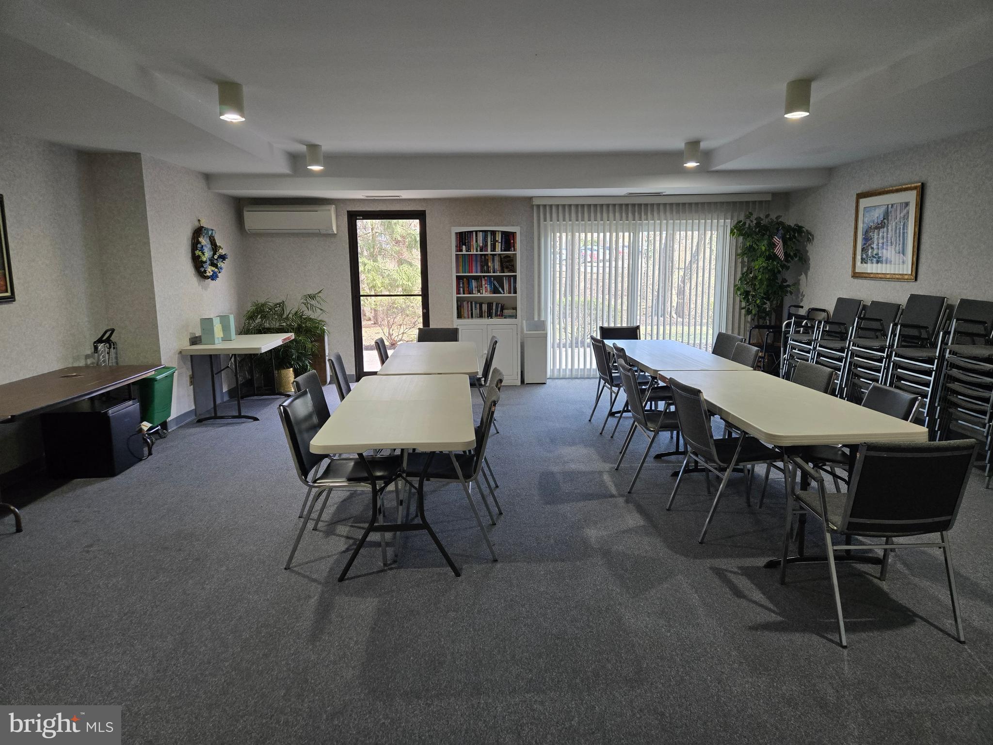 1000 Putnam Boulevard, Unit 603 Wallingford, PA 19086 - Photo 40 of 44 a view of a dining room with furniture