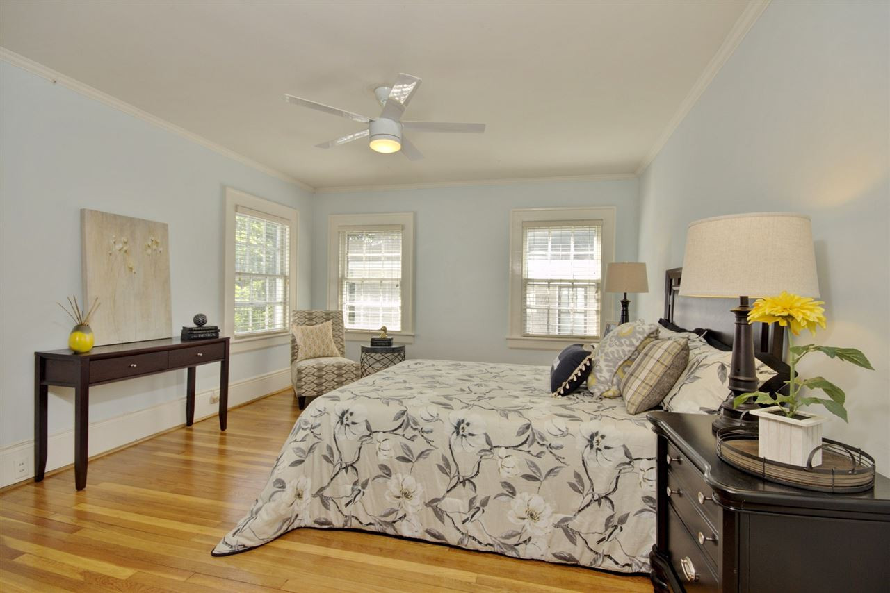 2302 Fairview Road Raleigh, NC 27608 - Photo 12 of 25 This large bedroom is a nice, bright getaway. Master Bedroom