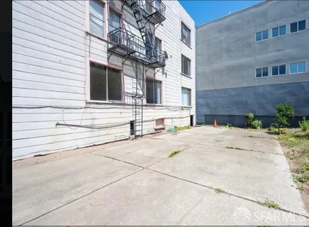 a view of a house with a road