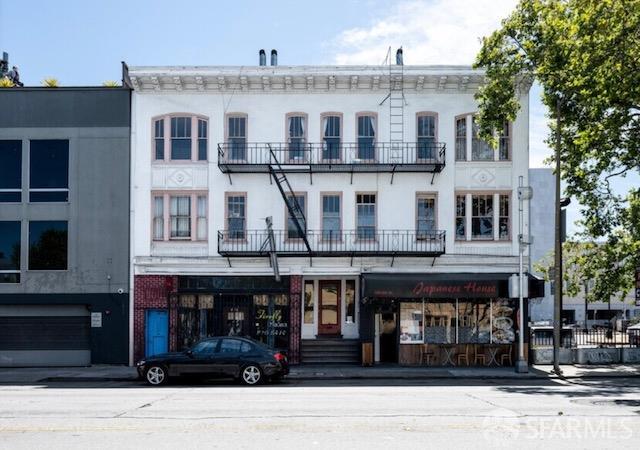 480-484 6th Street San Francisco, CA 94103 - Photo 14 of 52 a front view of a large building and a street