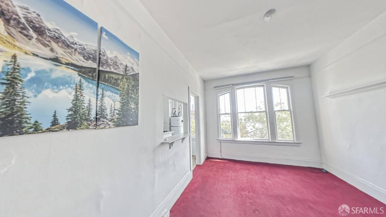 480-484 6th Street San Francisco, CA 94103 - Photo 18 of 52 a view of an empty room with a window