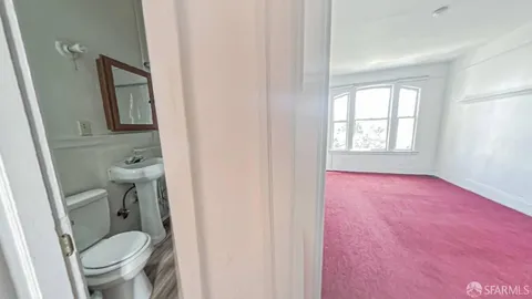 a bathroom with a toilet