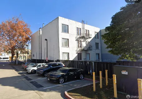 a car parked in front of a house