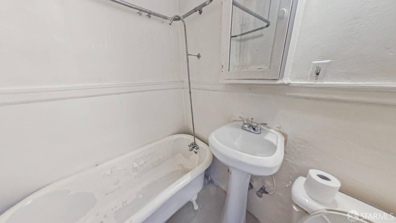 480-484 6th Street San Francisco, CA 94103 - Photo 26 of 52 a bathroom with a sink a toilet and bathtub