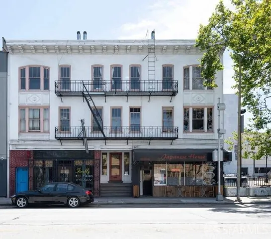 a front view of a building with glass windows