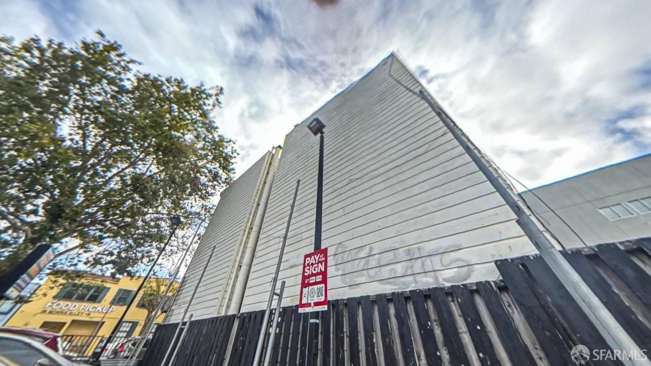 480-484 6th Street San Francisco, CA 94103 - Photo 41 of 52 a view of a house with a wooden fence