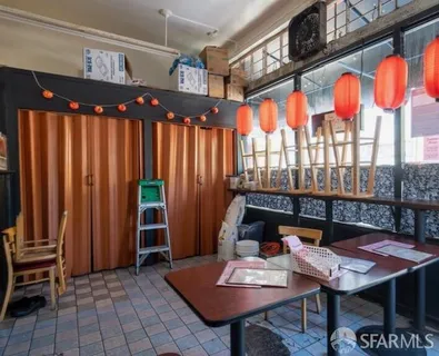 a outdoor living space with furniture and a potted plant