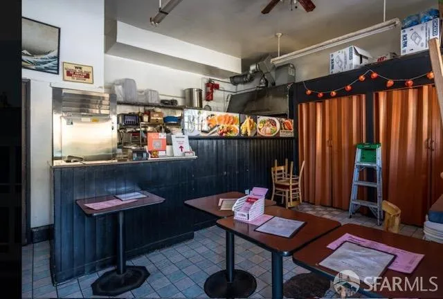 a room with furniture a rug and a table