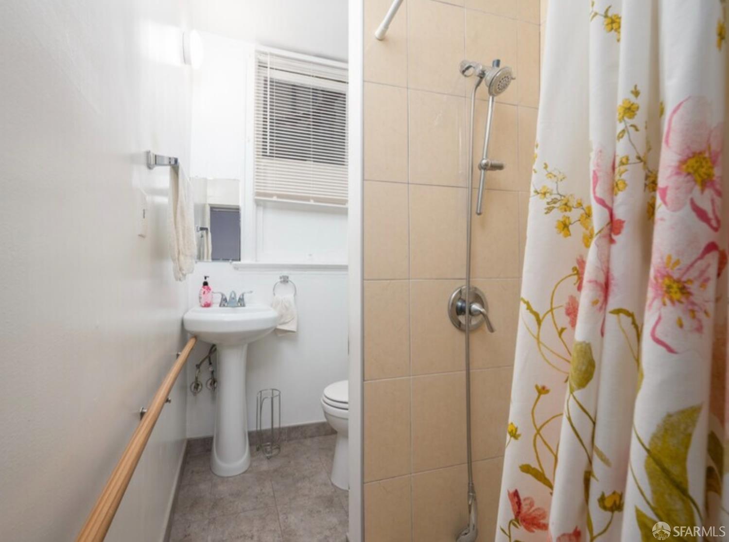 480-484 6th Street San Francisco, CA 94103 - Photo 10 of 52 a bathroom with a sink toilet and shower