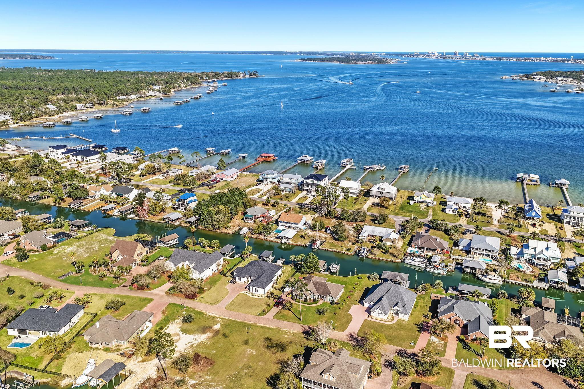 6434 County Road 95 Elberta, AL 36530 - Photo 95 of 99 Aerial perspective of suburban area with a nearby body of water