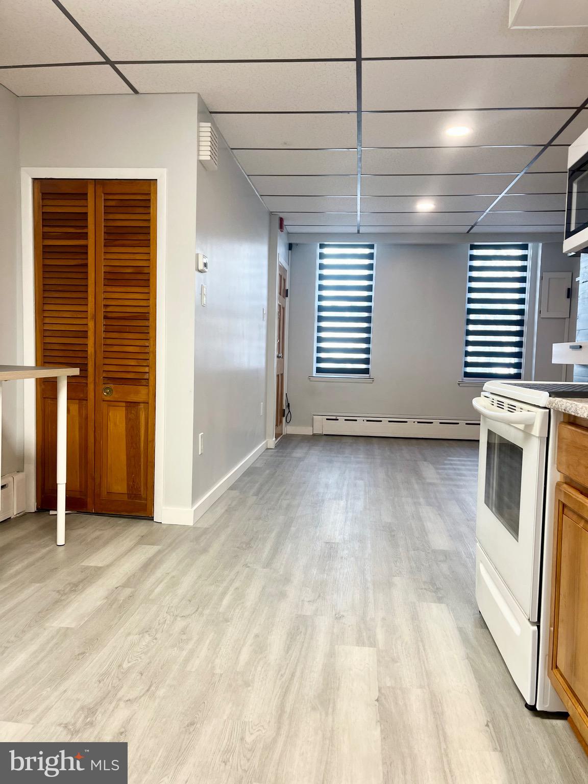 1304 Jackson Street, Unit 1 Philadelphia, PA 19148 - Photo 6 of 17 a view of an empty room with a window