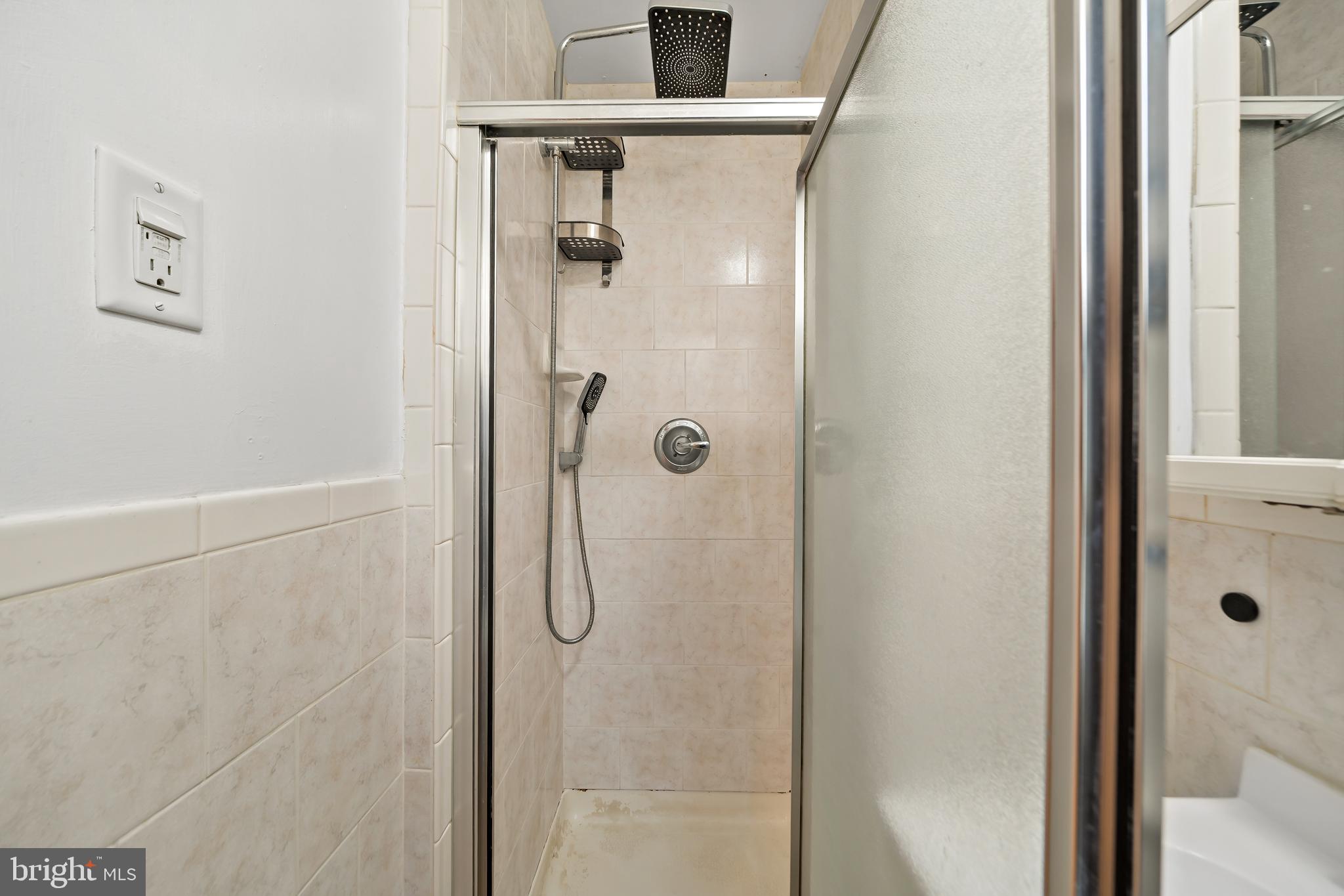 1304 Jackson Street, Unit 1 Philadelphia, PA 19148 - Photo 10 of 17 a bathroom with a shower