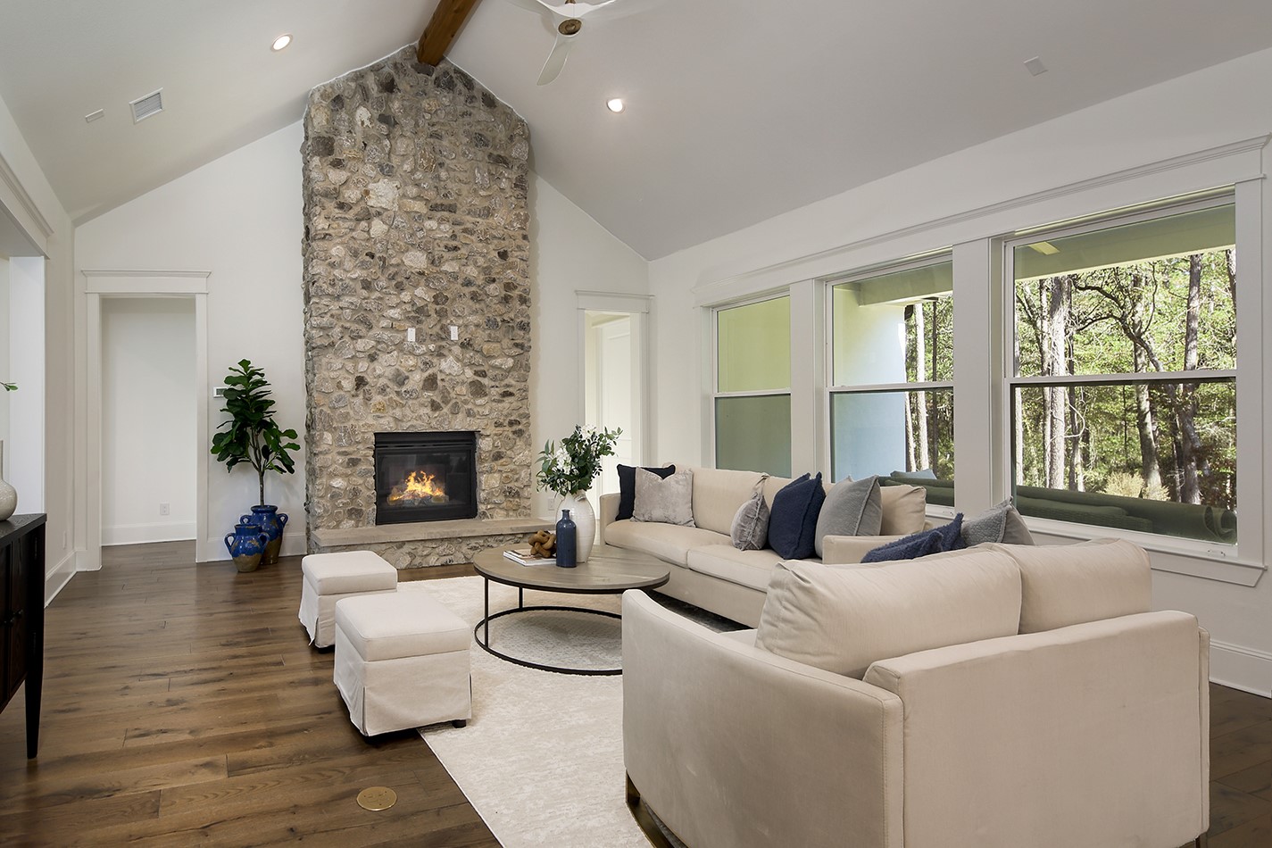 630 Lonestar Road Huntsville, TX 77340 - Photo 10 of 48 a living room with furniture fireplace and a large window